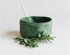 Green fabric travel bowl for dogs and cats