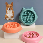 Slow feeder dog bowl in green, orange, and pink