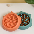 Slow feeder pet bowls filled with kibble
