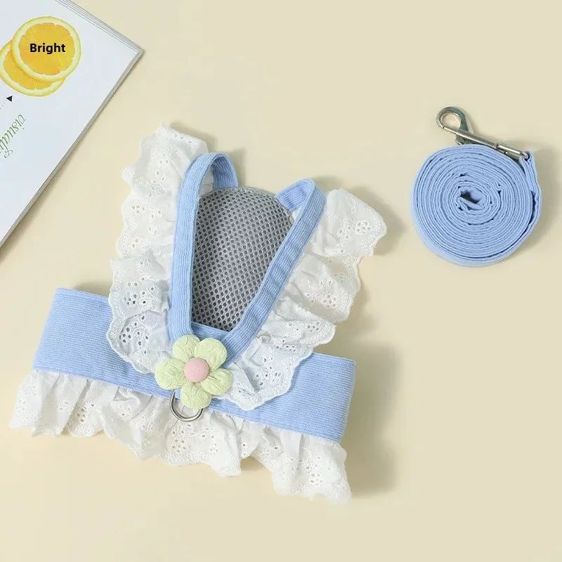 Blue ruffled cat harness, angled view